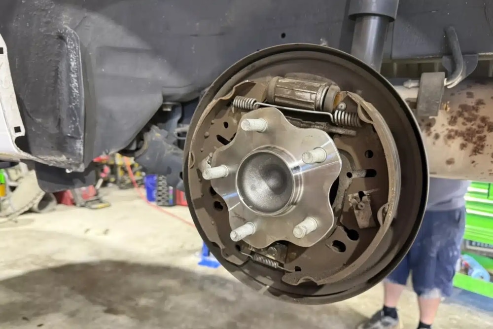 Brake Inspection in Plant City FL At My Car Guy of Plant City. Close-up of a vehicle brake in auto repair shop