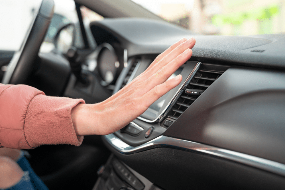 Auto A/C Repair in Plant City FL At My Car Guy of Plant City. Image of a person checking a car’s air conditioning system