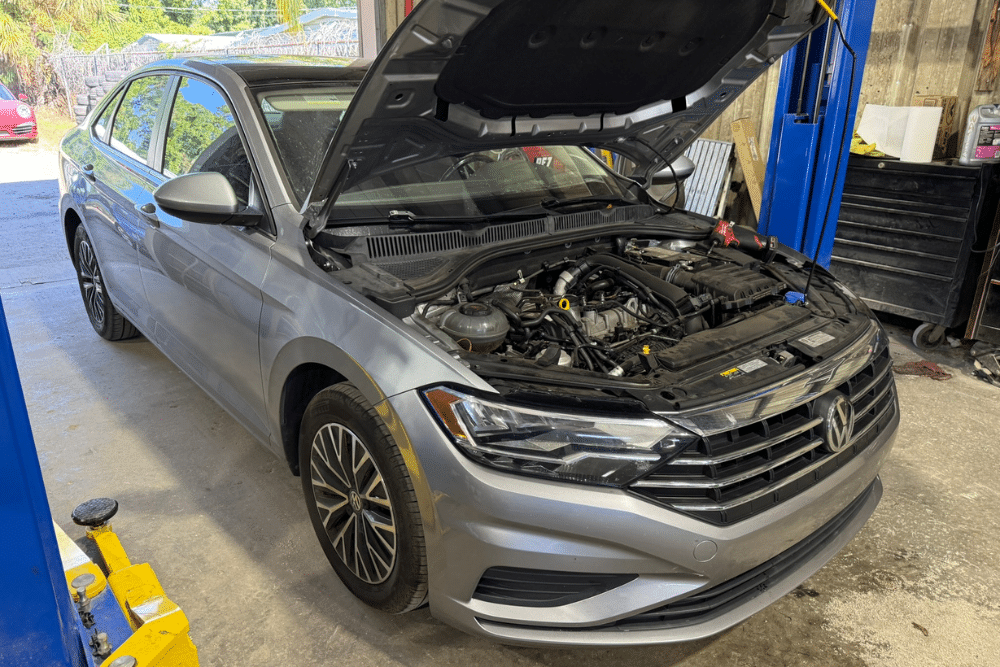 Spring Maintenance European and Domestic Cars, Preventative Maintenance in Plant City FL At My Car Guy of Plant City. Vehicle with open hood in auto repair shop during spring car maintenance service